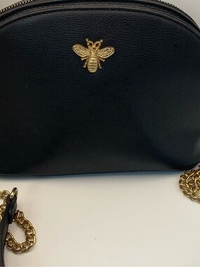 Elegant Black Shoulder Bag with Gold Bee Accent